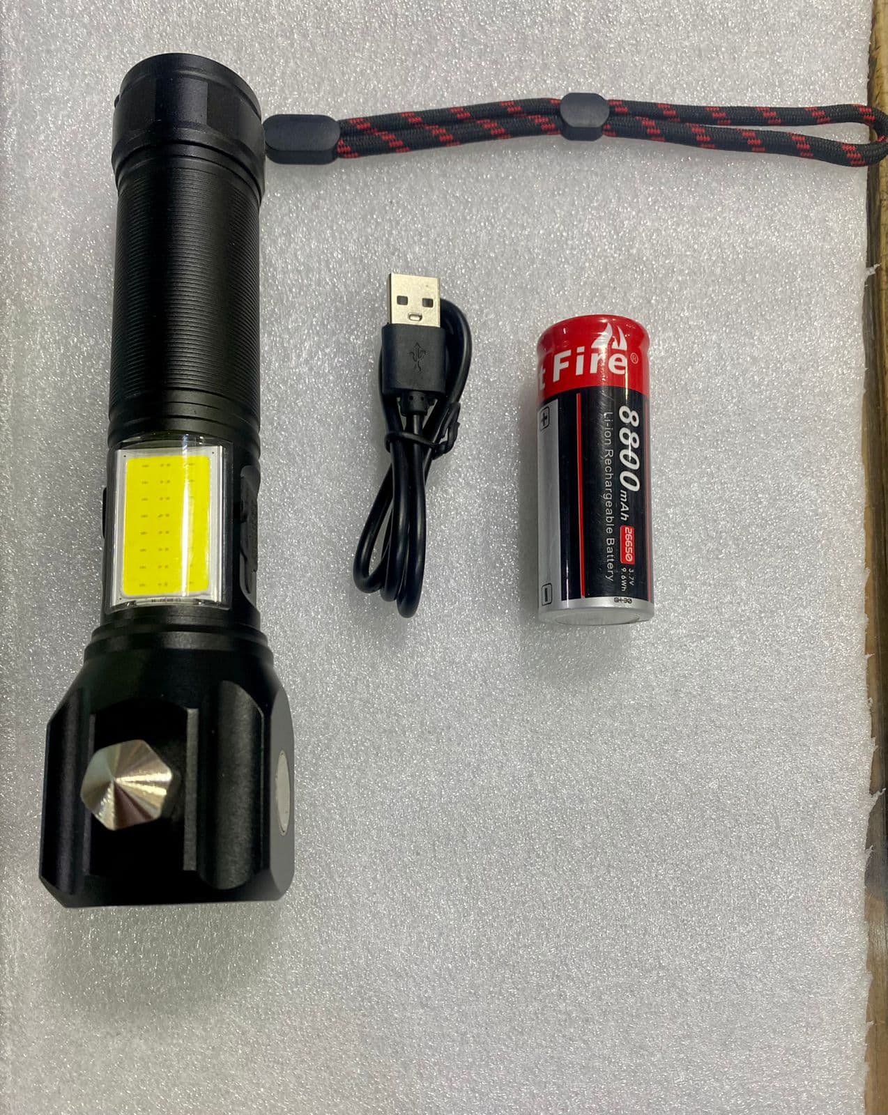 Ruilang 12000mAh Rechargeable Multifunctional Torchlight | High-Power LED Flashlight for Outdoor and Emergency Use